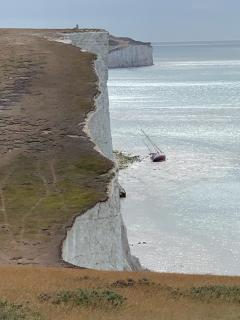 This yacht had recently run aground on the rocks below the Seven Sisters.